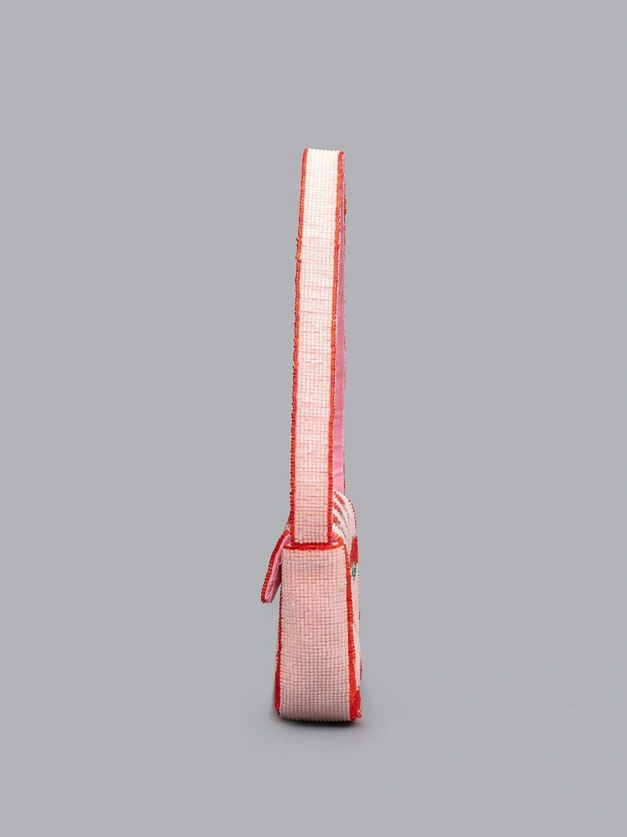 Material Performance: Double polyester fabric for exterior and lining, wear-resistant and lightweight, tightly woven rice beads with firm stitching, not easy to fall off Structure Design: Mini horizontal square bag body, single full beaded matching shoulder strap, hidden built-in magnetic buckle closure Bead Craft: Dense uniform rice bead embroidery, clear heart and cherry fruit printing patterns, smooth neat bead surface without burrs Silhouette Advantage: Medium-firm fabric keeps the bag upright and three-dimensional, will not deform or collapse after long-term storage Storage Capacity: Compact 21514cm size, enough to hold mobile phone, lipstick, keys, bank cards and other daily small belongings Color Selection: Six different bead pattern color styles for mixed wholesale matching Craftsmanship: Integrated seamless stitching on bag edges, reinforced connection between shoulder strap and bag body, durable for daily frequent use Wearing Structure: Single underarm shoulder strap design, lightweight and no shoulder pressure for all-day carrying Styling Positioning: Fresh sweet heart cherry rice bead embroidery mini underarm bag, multi-scene daily summer women shoulder handbag Applicable Matching: Casual sundresses, camisoles, jeans, knit tops and other daily casual summer outfits